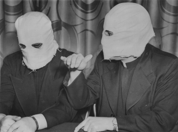1951, November 26. BA. New York, New York. Faced masked, Ukrainian priests tell of Red oppression. Acme Telephoto (Front)