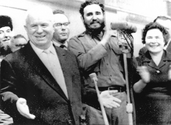 1964, January 17. AA. Kalinin, Soviet Russia. Cuban Premier Fidel Castro applauds as Soviet Premier Nikita Khrushchev speaks to mill workers at a mass meeting in Kalinin (now Tver) 1/17. UPI Radiophoto from TASS (Front)