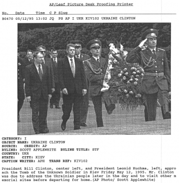 1995, May 12. CB. Kyiv, Ukraine. President Bill Clinton, center left, and President Leonid Kuchma, left, approach the Tomb of the Unknown Soldier in Kyiv Friday 12, 1995. Mr. Clinton was due to address Ukrainian people later in the day and to visit other memorial sites before departing for home. AP Photo by Scott Applewhite (Back)