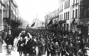 1918, May 1. AA. Moscow, Soviet Russia. The first parade of the Red Army. The parade was initiated and organized by Lev Trotsky and attended by Vladimir Lenin and other Bolshevik's leaders. The event consisted of the rally and parade on the Red Square and military parade and airshow at Khodynka Field. National Archives (Front)