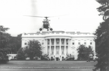 1958, May 23. CA. Washington, District of Columbia. OVER THE TREE TOPS. President Dwight D. Eisenhower is air borne from the White House lawn and about as high as the mansion's roof as he flies today to his Gettysburg, PA. farm for the weekend. The President is aboard a Marine [Sikorsky H-34] helicopter. This presidential 'copter flight is the first whith a landing on his farm. AP Wirephoto (Front)