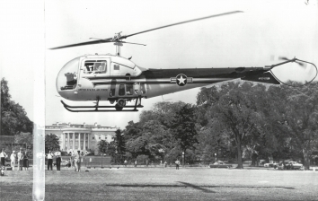 1957, May 9. FA. Washington, District of Columbia. Presidential Helicopter On Test Flight. One of President Eisenhower's much-publicized helicopters hovers above the Ellipse, a spacious park just south of the White House grounds, during a practice flight Wednesday. Press Secretary James C. Hagerty said the President plans to make his first flight in one of the "whirlybirds" in mid-July during the annual Operation Alert. AP Wirephoto (Front)