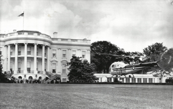 1957, May 31. GA. Washington, District of Columbia. 'COPTER LANDS AT WHITE HOUSE 'AIRPORT.' One of President Dwight D. Eisenhower's new helicopters [Bell UH-13J] comes in for a practice landing on the White House lawn a short distance from the south entrance today. This Bell UH-13J was the first helicopter to transport a President was in 1957. The H-13 was replaced by the Sikorsky H-34 in 1958. AP Wirephoto (Front)